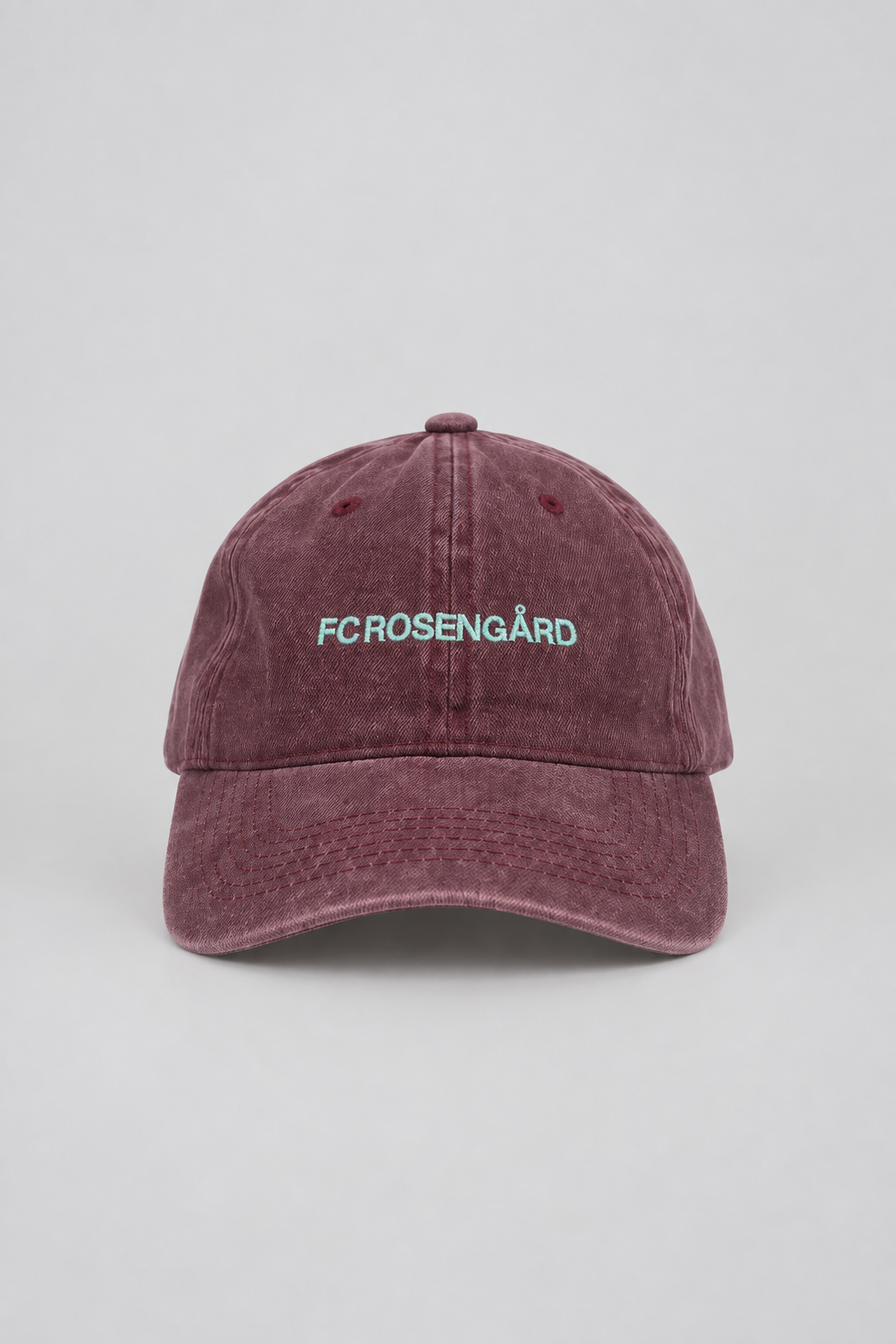 Commercial front-view packshot of the burgundy FC Rosengård cap
