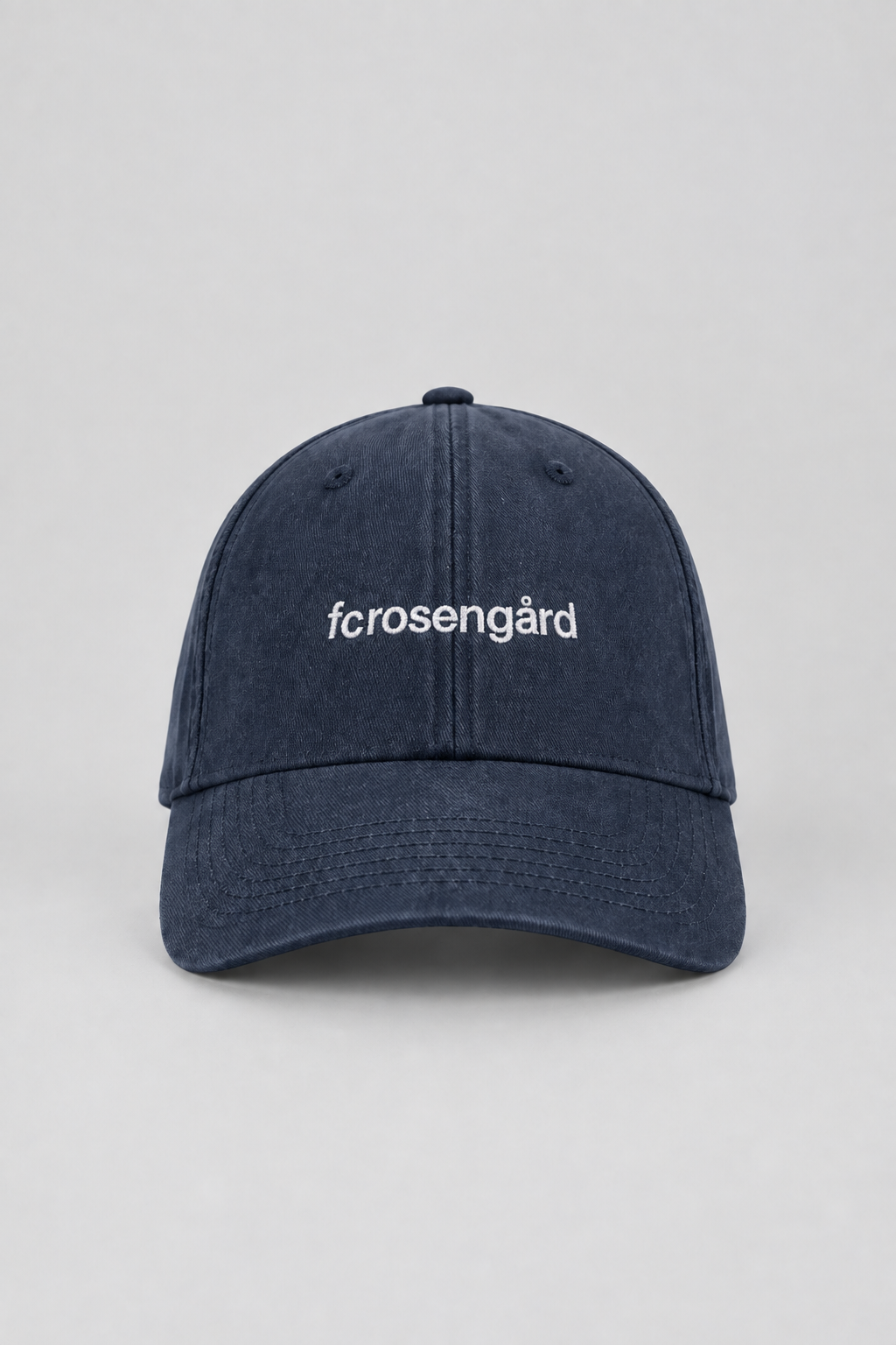 Commercial front-view packshot of the embroidered navy cap