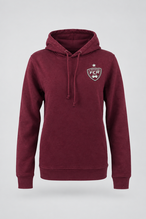 Commercial packshot of the burgundy FC Rosengård hoodie on a light gray seamless backdrop