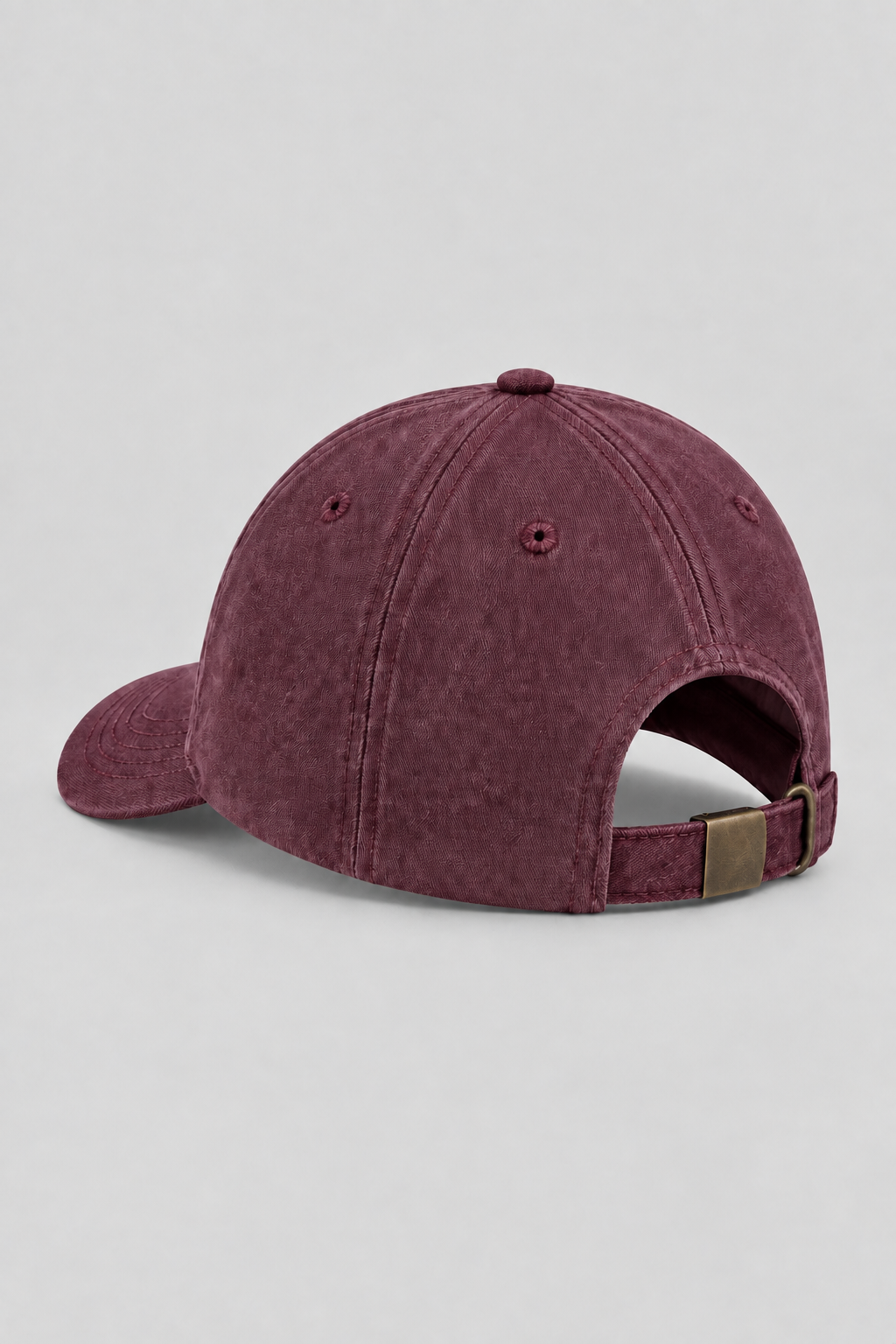 Commercial rear-view packshot showing the burgundy cap strap and buckle