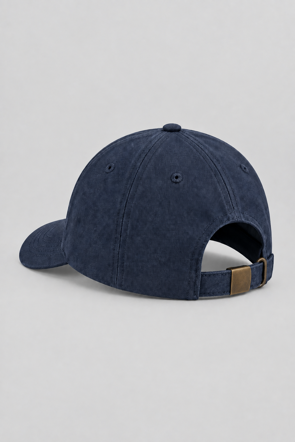 Commercial rear-view packshot showing the cap strap and brass hardware